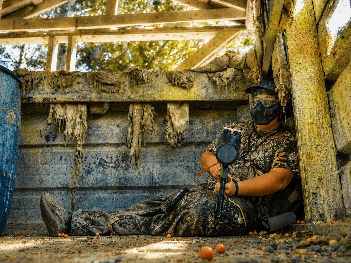 Player reloading inside a wooden bunker